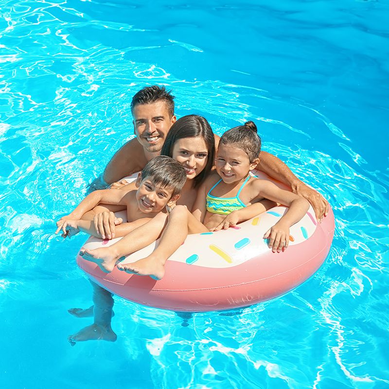 family in pool