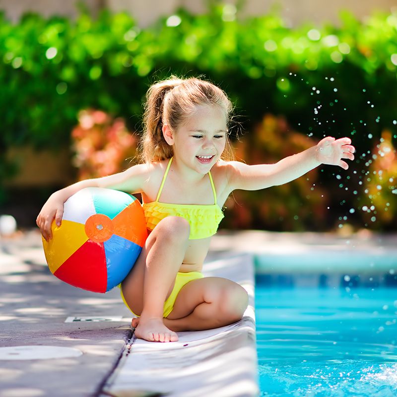 little girl playing with water